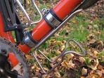 Blackburn stainless cages - If you've not got the mounts then Jubilee clips!